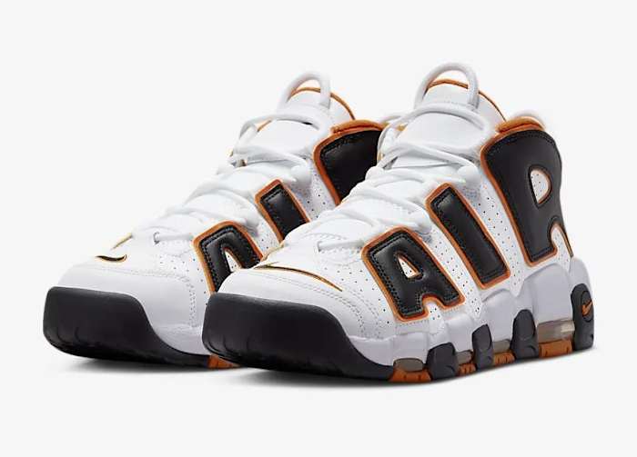 Side view of Scottie Pippen's white and black Nike sneakers.